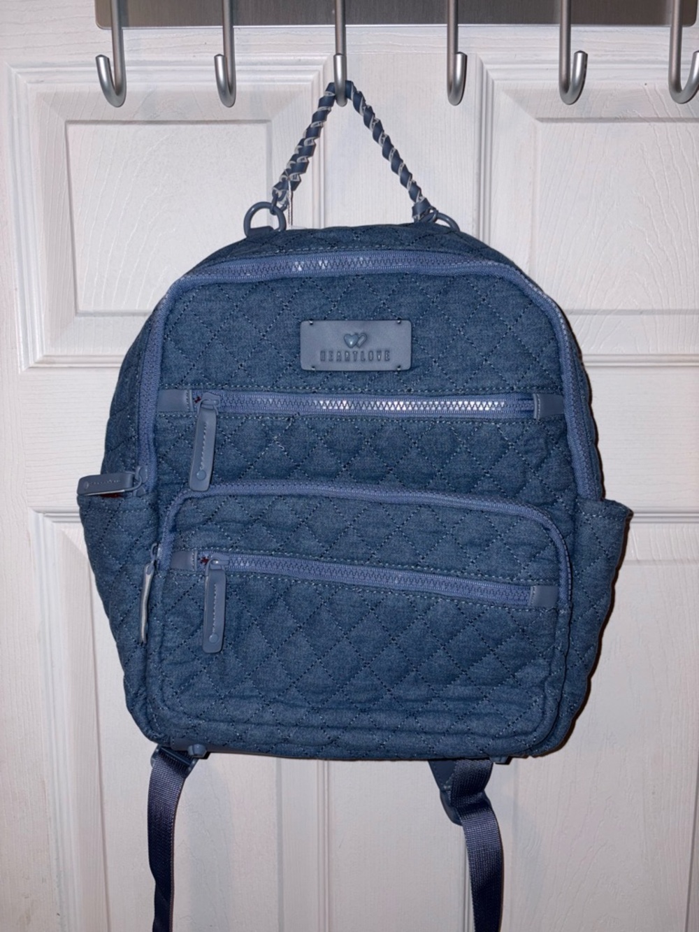 Quilted denim backpack by HeartLove by Charo in a blue “jean” wash